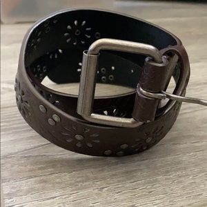 Brown leather belt with flower cutouts